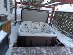 Coast Spas Apex Curve hot tub installed in decking